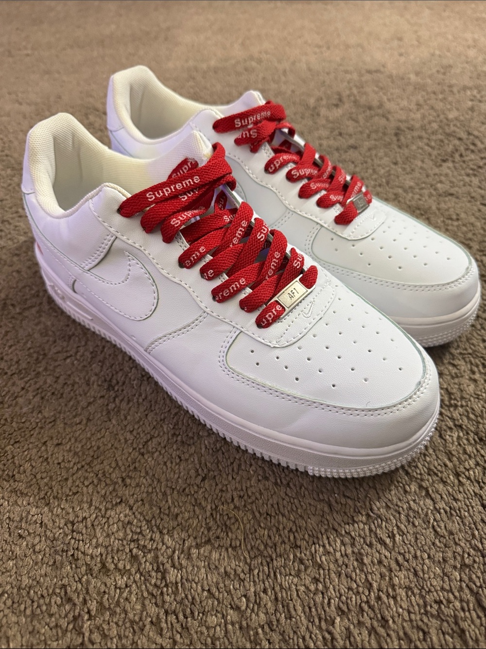 Nike White Low-Top Athletic Shoes with Red Laces